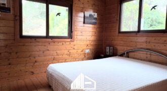 MARTINA’S WOODEN HOUSE